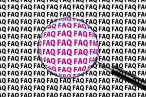 magnifying glass over a background of the repeated acronym "FAQ"