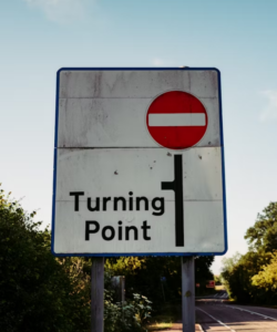 road sign that says "turning point"