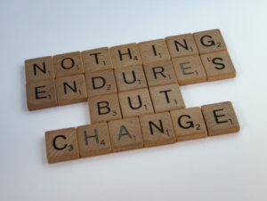 scrabble tiles spelling the phrase "nothing endures but change"